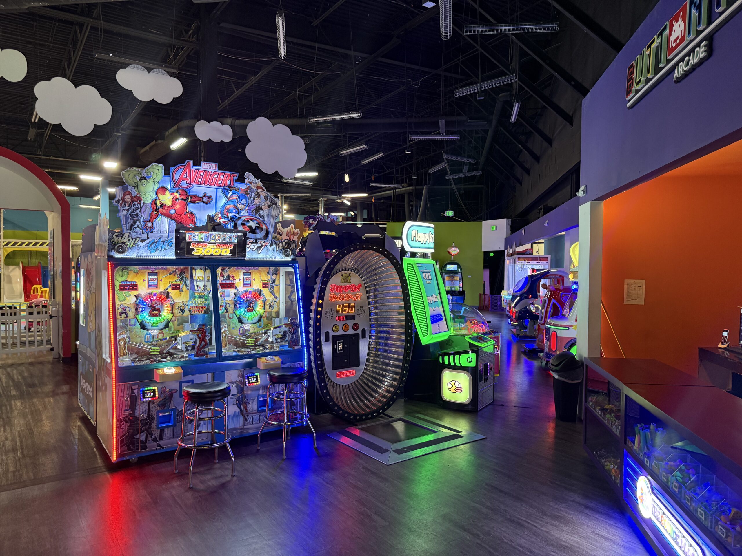Arcade games and redemption area inside The Bounce Place at Colorado Mills